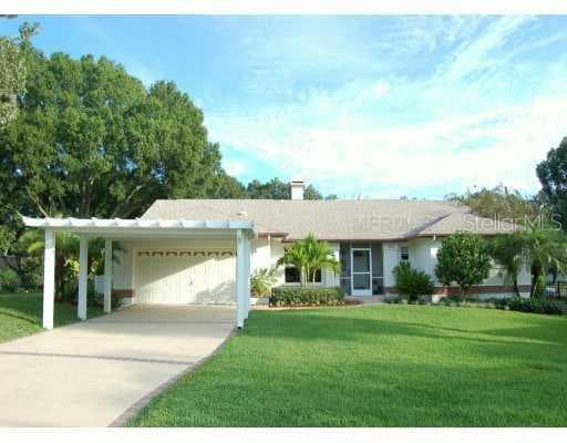 3418 E LAKE DRIVE LAND O LAKES, FL 34639