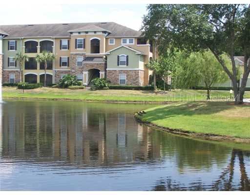 10213 COURTNEY PALMS BOULEVARD UNIT 104