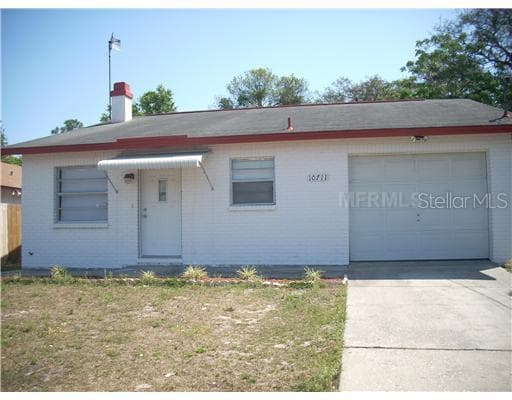 10711 N HARTTS DRIVE TAMPA, FL 33617