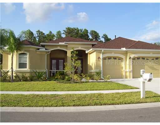 1544 BEACONSFIELD DRIVE WESLEY CHAPEL, FL 33543