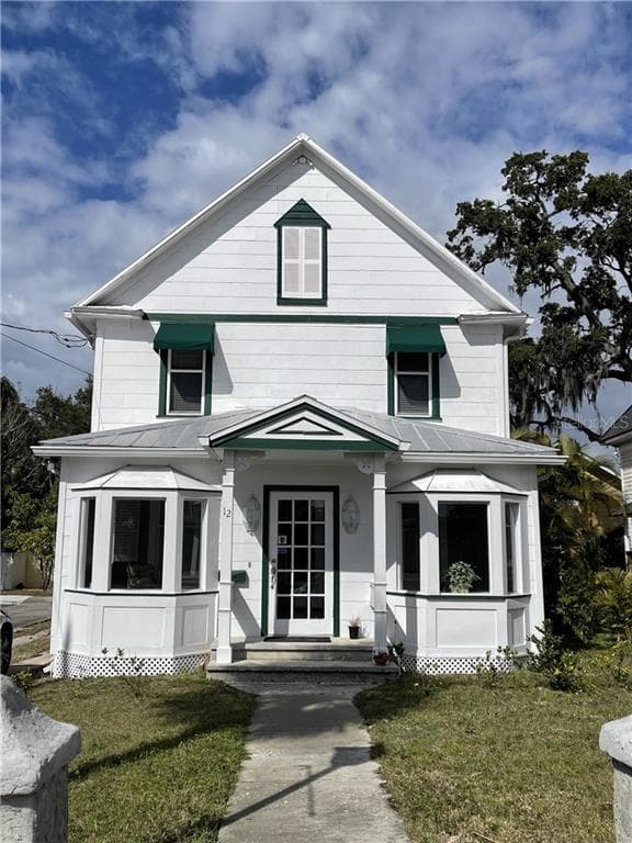 12 W ORANGE STREET TARPON SPRINGS, FL 34689