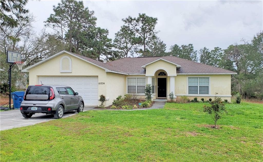 10374 GANNET AVENUE WEEKI WACHEE, FL 34613