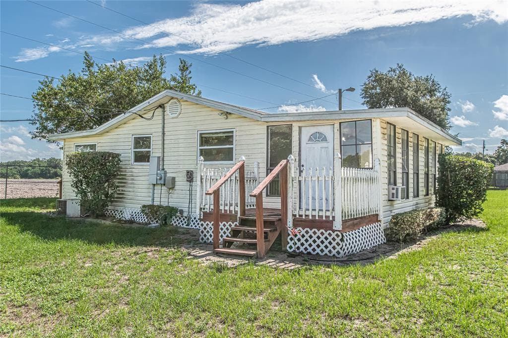 11824 WEAVER LANE THONOTOSASSA, FL 33592