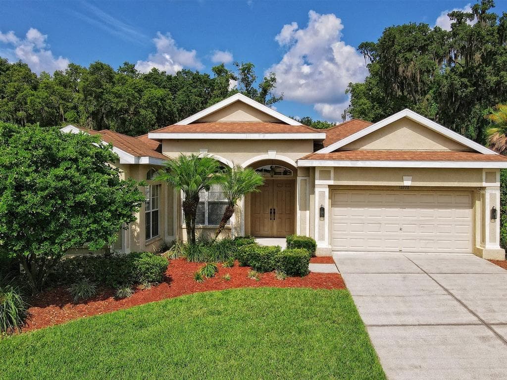 12228 WOODLANDS CIRCLE DADE CITY, FL 33525
