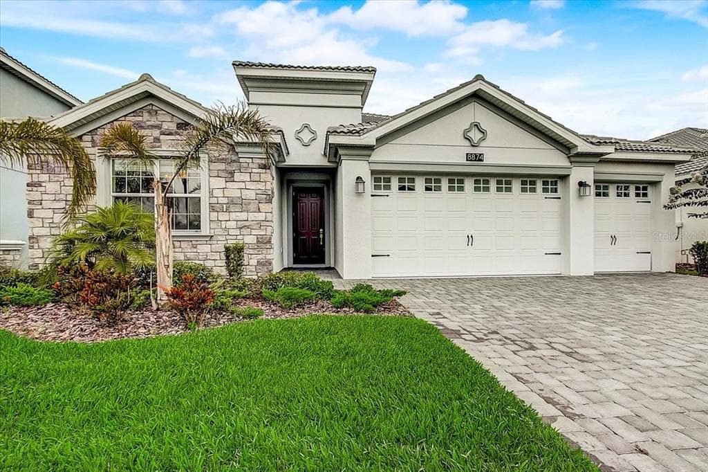 8874 BACKSPIN LANE CHAMPIONS GATE, FL 33896