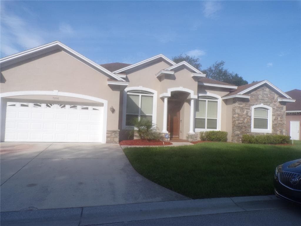 7216 REMINGTON OAKS DRIVE