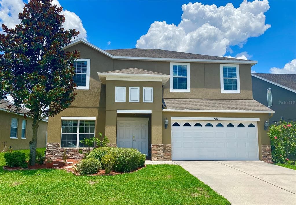 7712 RATHDOWN LANE WESLEY CHAPEL, FL 33545