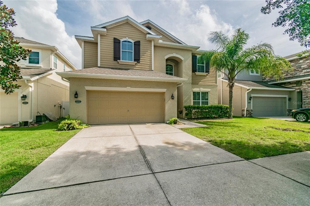 7982 CAMDEN WOODS DRIVE TAMPA, FL 33619