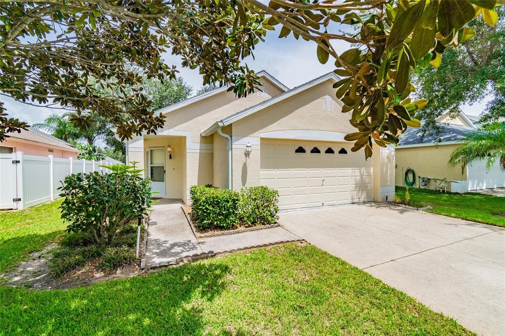 1703 MEADOW OAK LANE TARPON SPRINGS, FL 34689