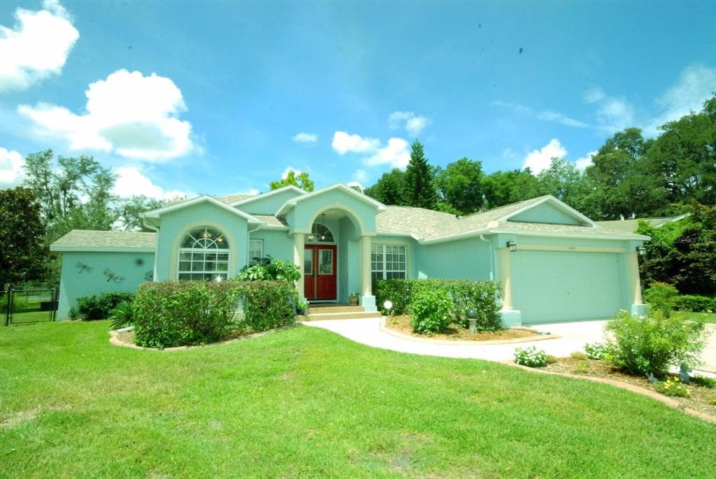 1442 CRAZY HORSE DRIVE LUTZ, FL 33559