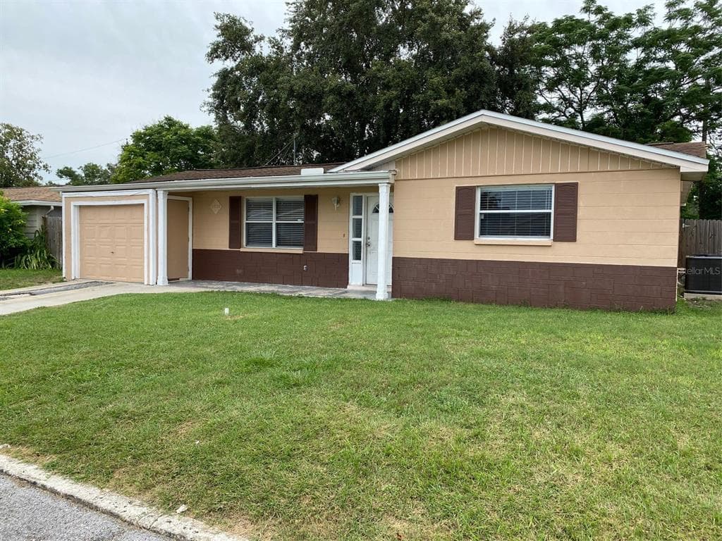 2526 SWEETWOOD DRIVE HOLIDAY, FL 34690