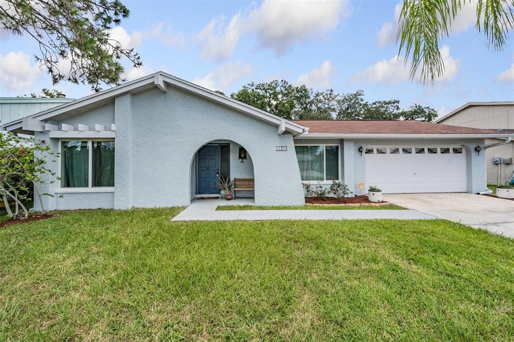 11319 HOLLYGLEN DRIVE TAMPA, FL 33624