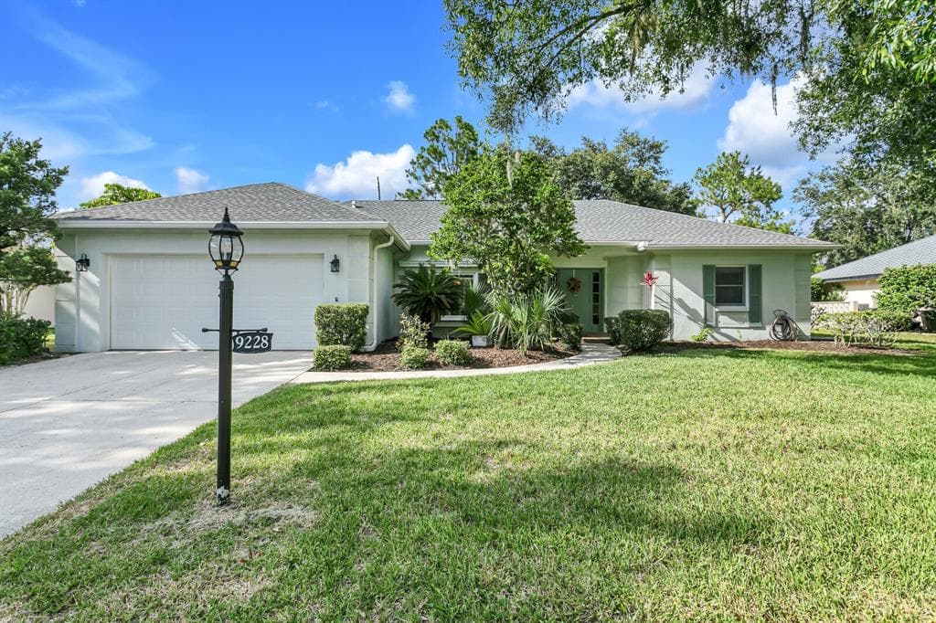 9228 PEBBLE CREEK DRIVE TAMPA, FL 33647