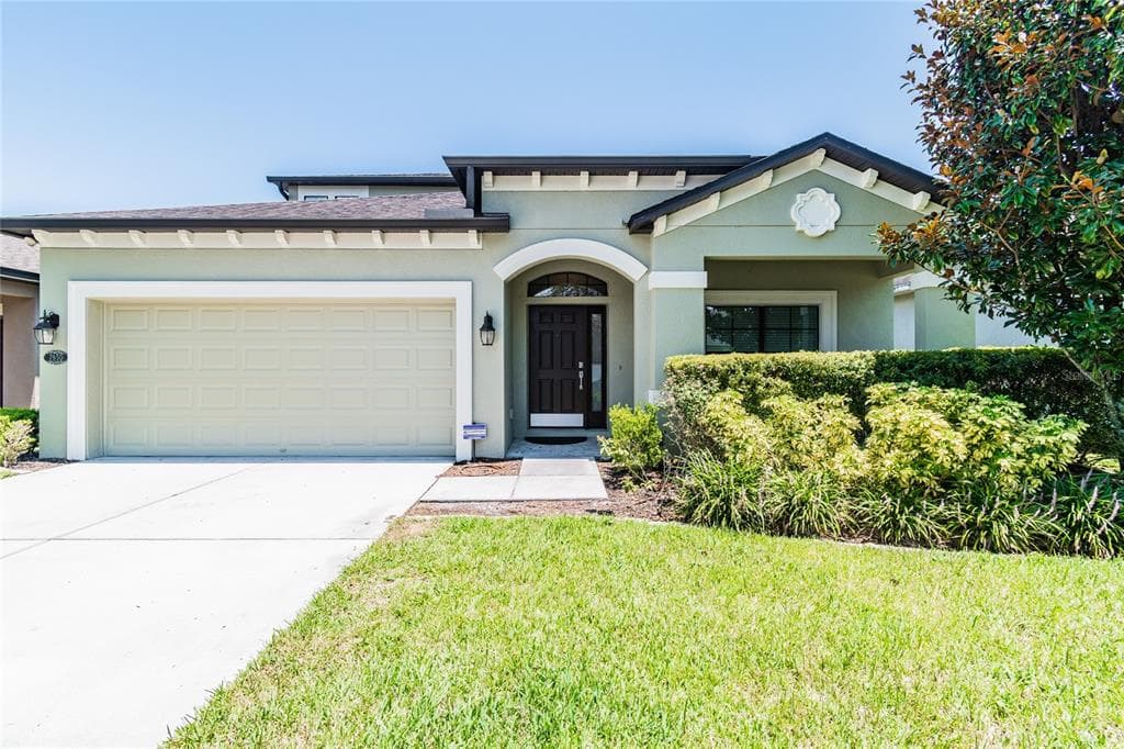 7950 CAMDEN WOODS DRIVE TAMPA, FL 33619