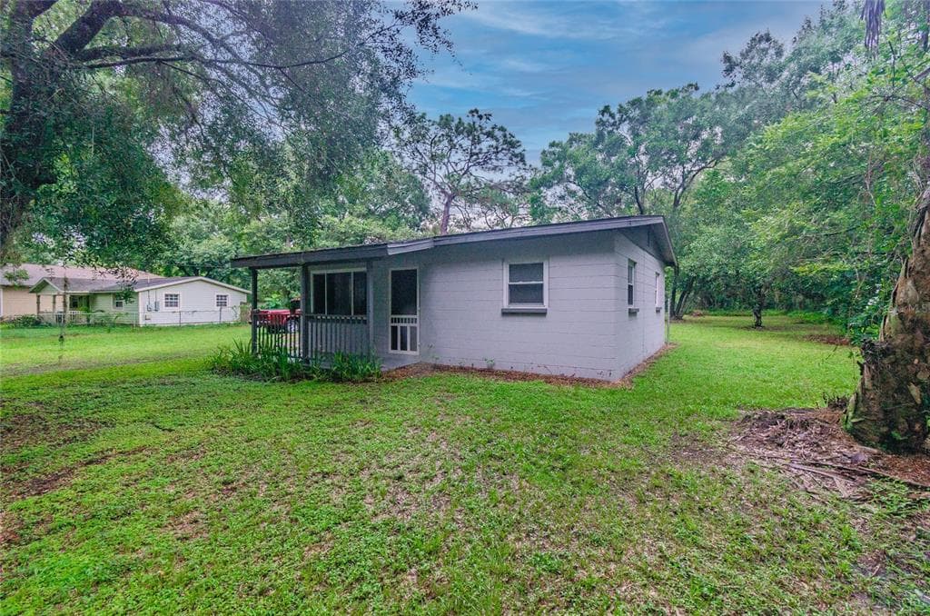 10411 N WOODMERE ROAD TAMPA, FL 33617
