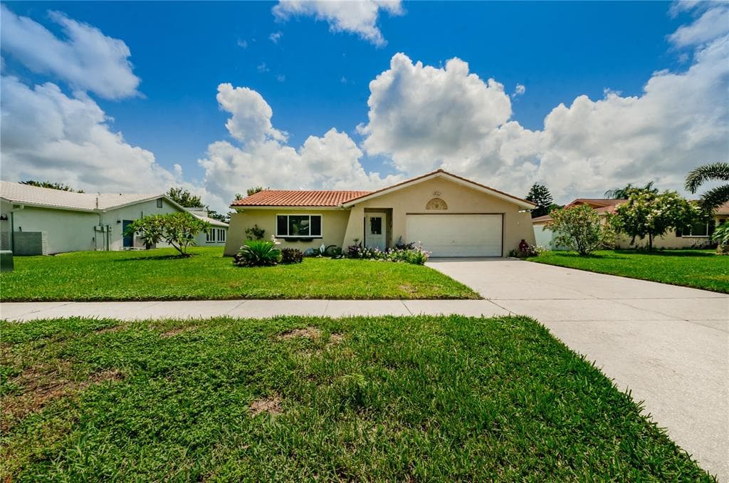 1167 RANCHWOOD DRIVE E DUNEDIN, FL 34698