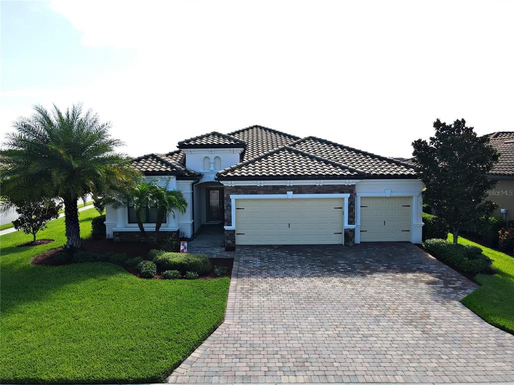 323 WHISPERING PALMS LANE