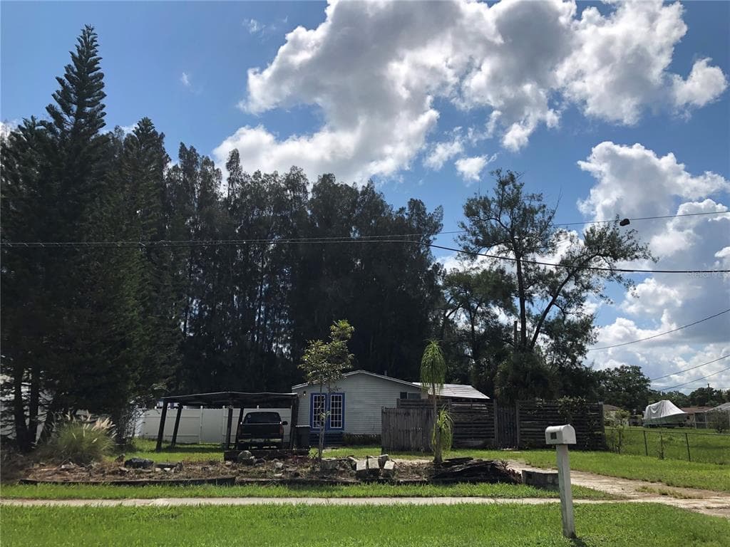 15411 HUTCHISON ROAD TAMPA, FL 33625