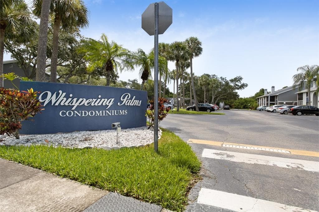 13303 WHISPERING PALMS PLACE SW UNIT 103 LARGO, FL 33774