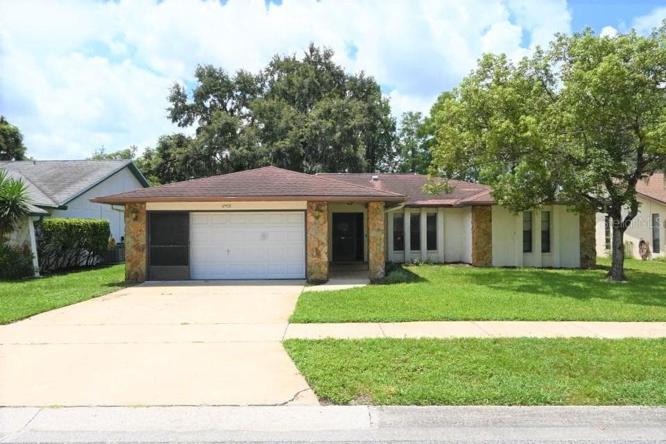 12408 GOLDEN OAK CIRCLE HUDSON, FL 34669