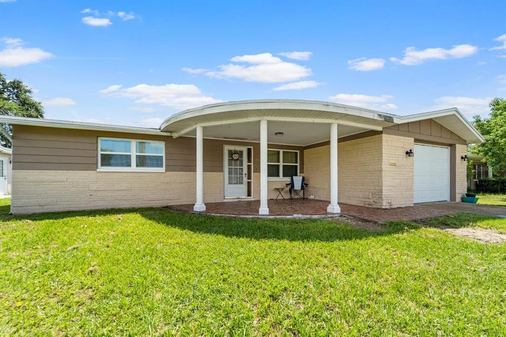 2100 LYRA DRIVE HOLIDAY, FL 34690