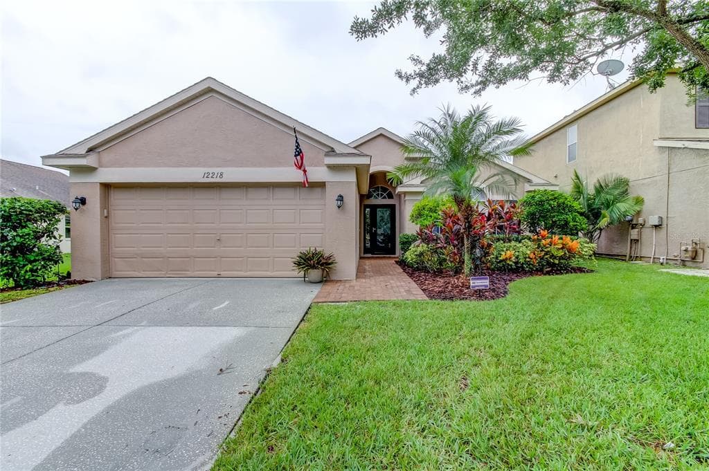 12218 BISHOPSFORD DRIVE TAMPA, FL 33626