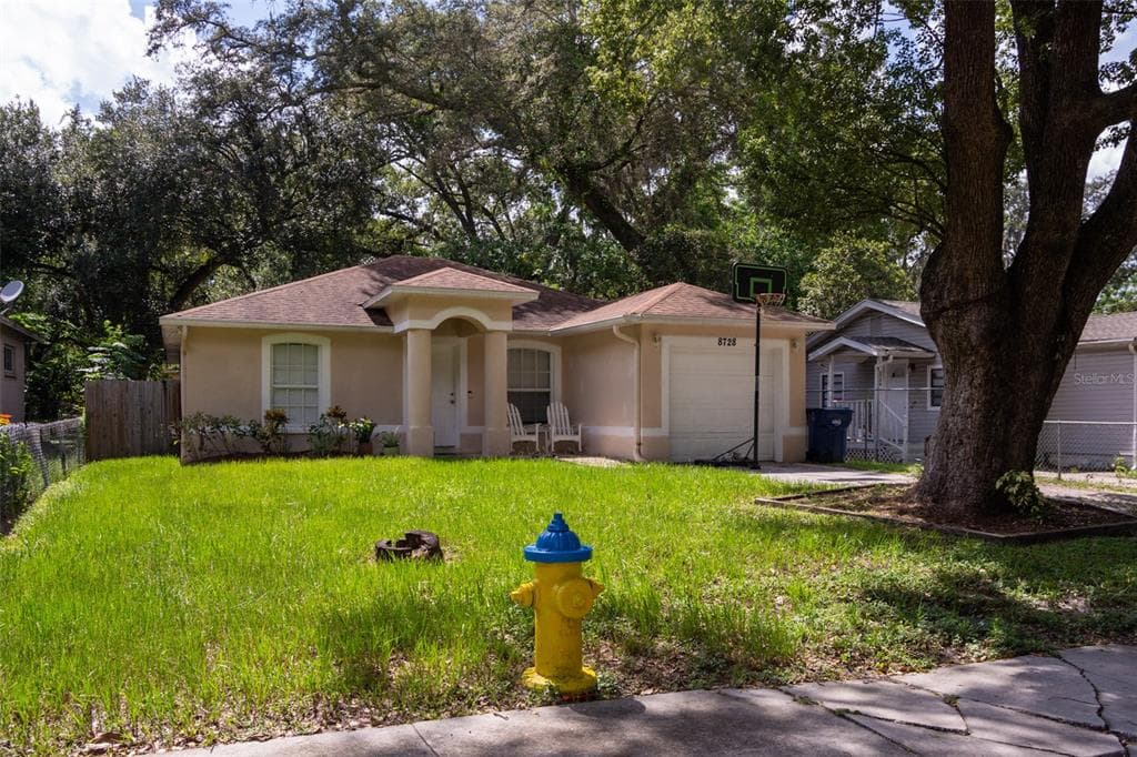 8728 N TEMPLE AVENUE TAMPA, FL 33617