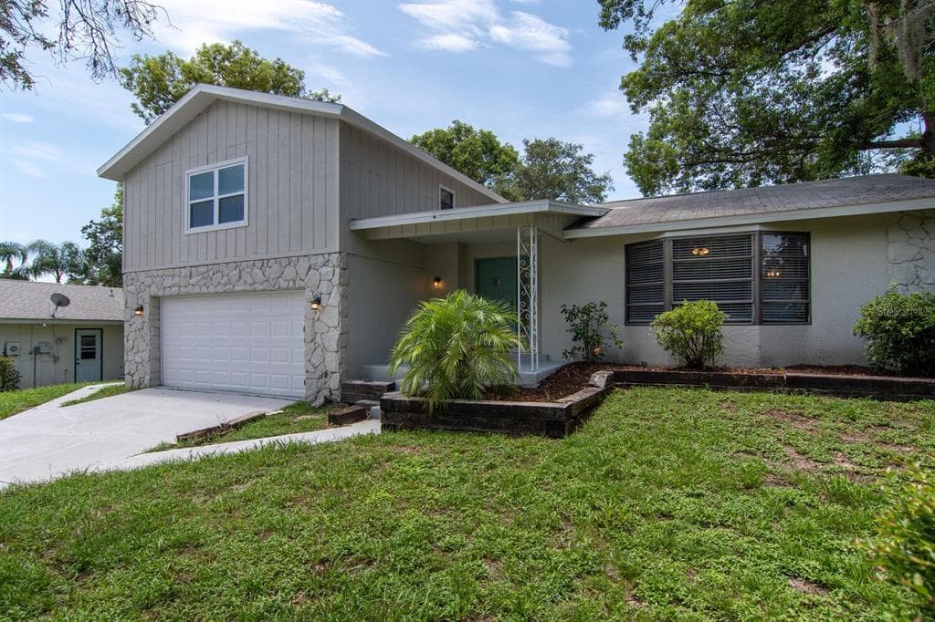 1208 ROLLINGWOOD DRIVE TARPON SPRINGS, FL 34689