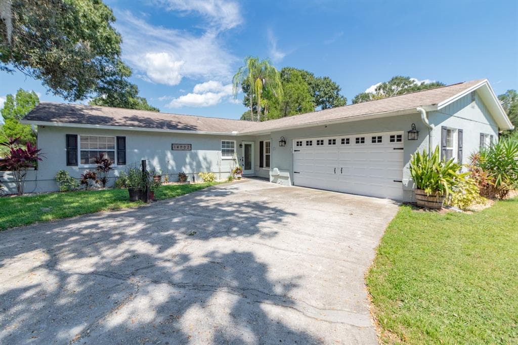 14002 CHERRY LAKE DRIVE TAMPA, FL 33618