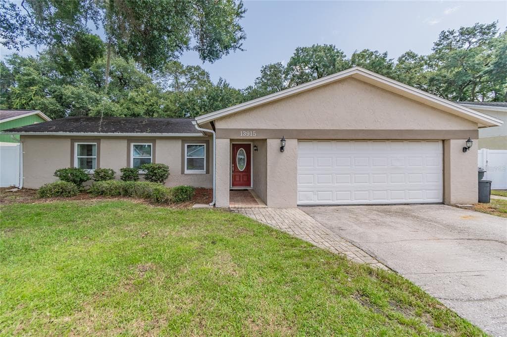 13915 BRIARDALE LANE TAMPA, FL 33618
