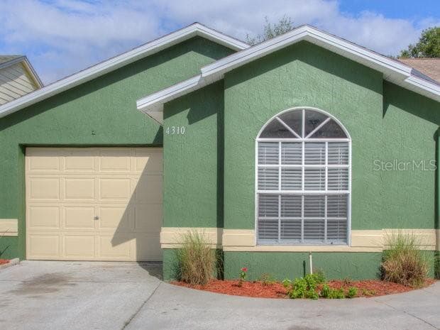 4310 LONGSHORE DRIVE LAND O LAKES, FL 34639