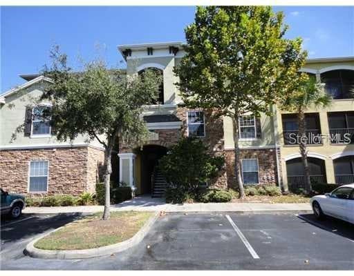 2402 COURTNEY MEADOWS COURT UNIT 302 TAMPA, FL 33619