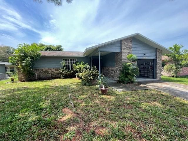 1052 GLENWOOD DRIVE DUNEDIN, FL 34698