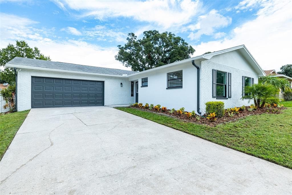 1940 BRIARWOOD STREET DUNEDIN, FL 34698