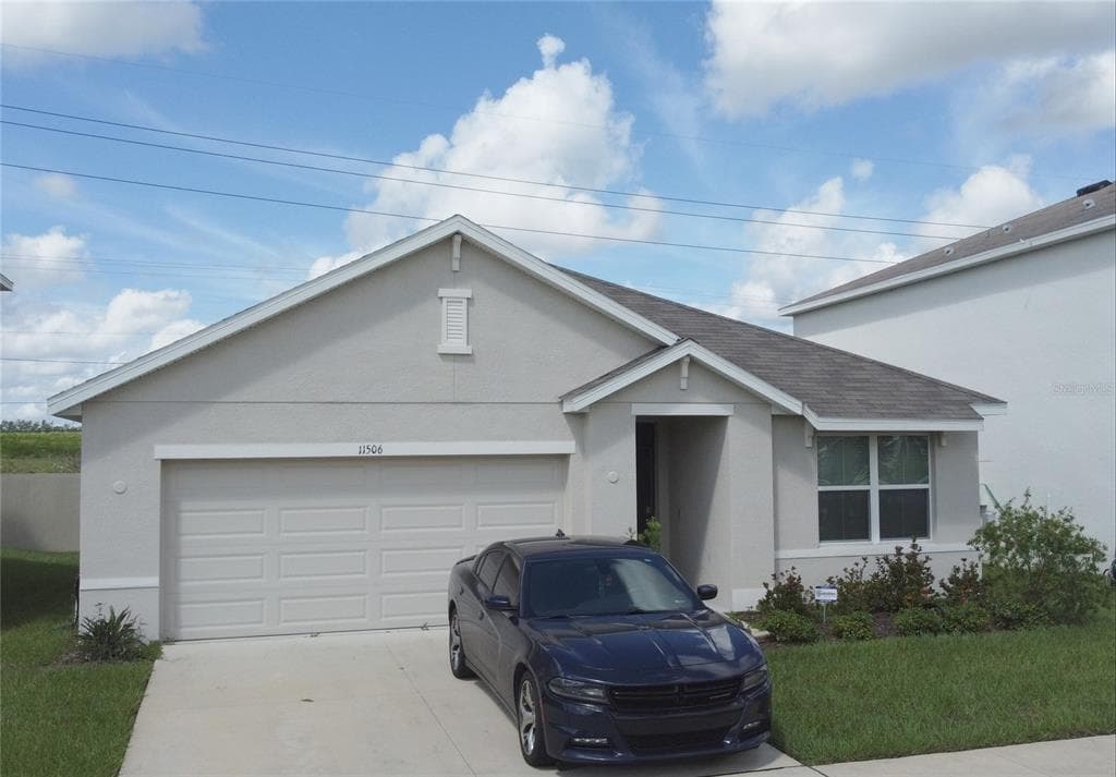 11506 KOTI CREEK LANE THONOTOSASSA, FL 33592