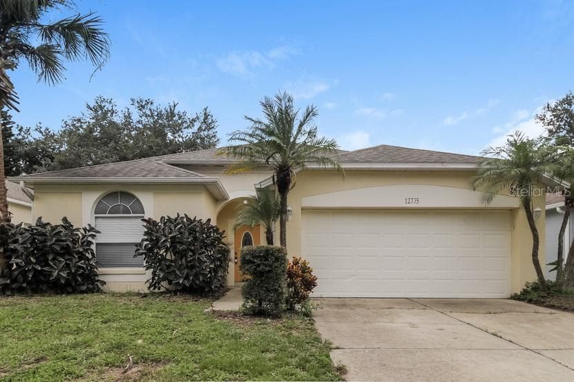 12735 WOODBURY OAKS DRIVE ORLANDO, FL 32828