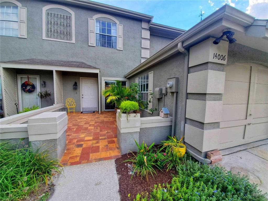 14006 TROUVILLE DRIVE TAMPA, FL 33624