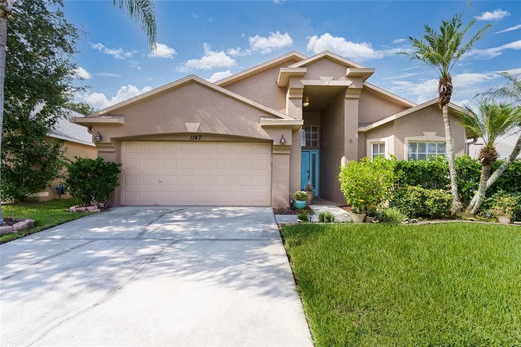 1147 CRIMSON CLOVER LANE WESLEY CHAPEL, FL 33543