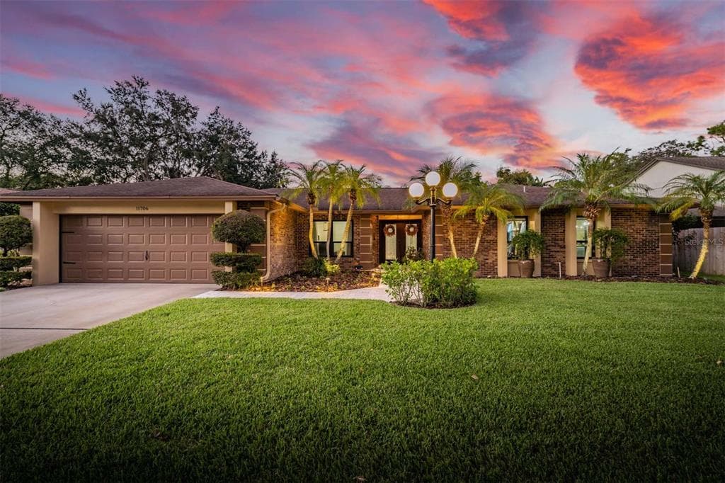 11706 ROLLING OAKS LANE TAMPA, FL 33618