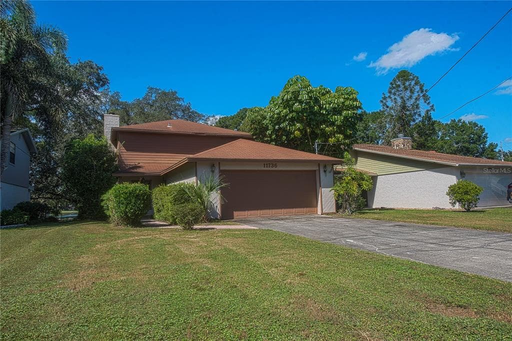 11736 FOREST HILLS DRIVE