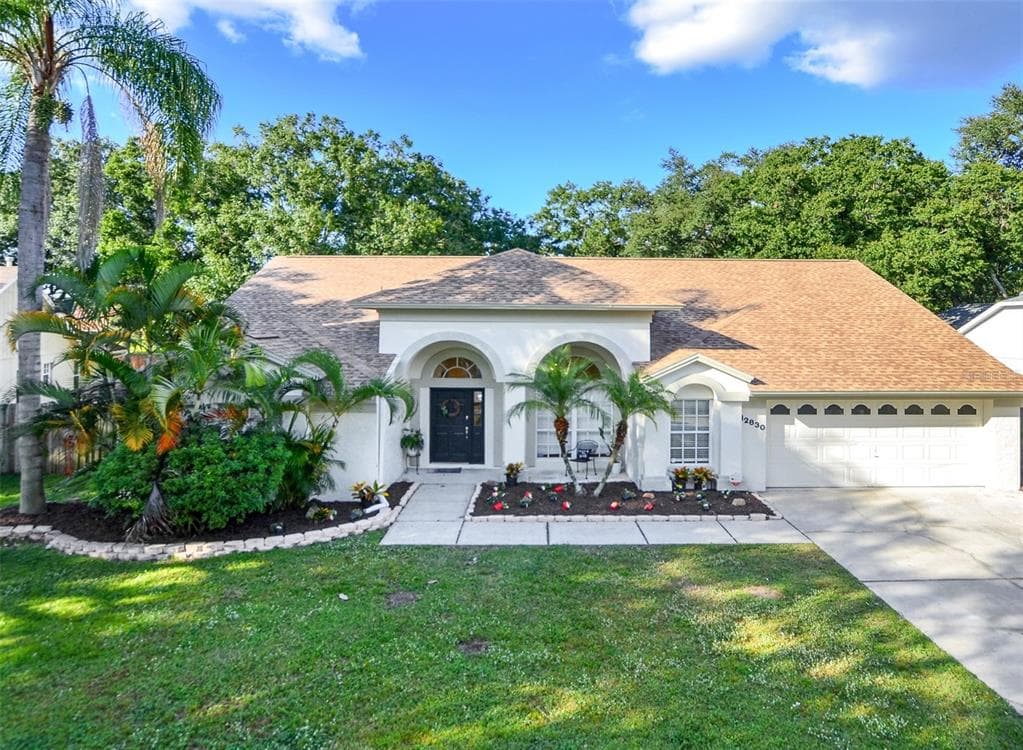 12830 WALLINGFORD DRIVE TAMPA, FL 33624