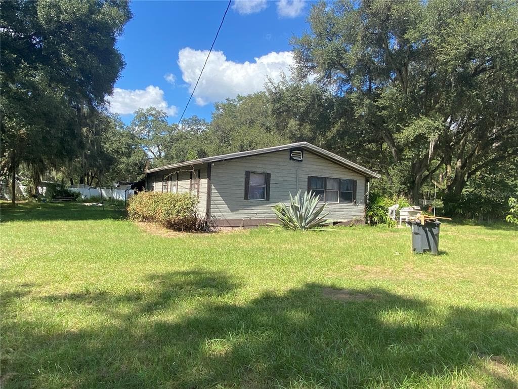 12214 GROVEWOOD AVENUE THONOTOSASSA, FL 33592