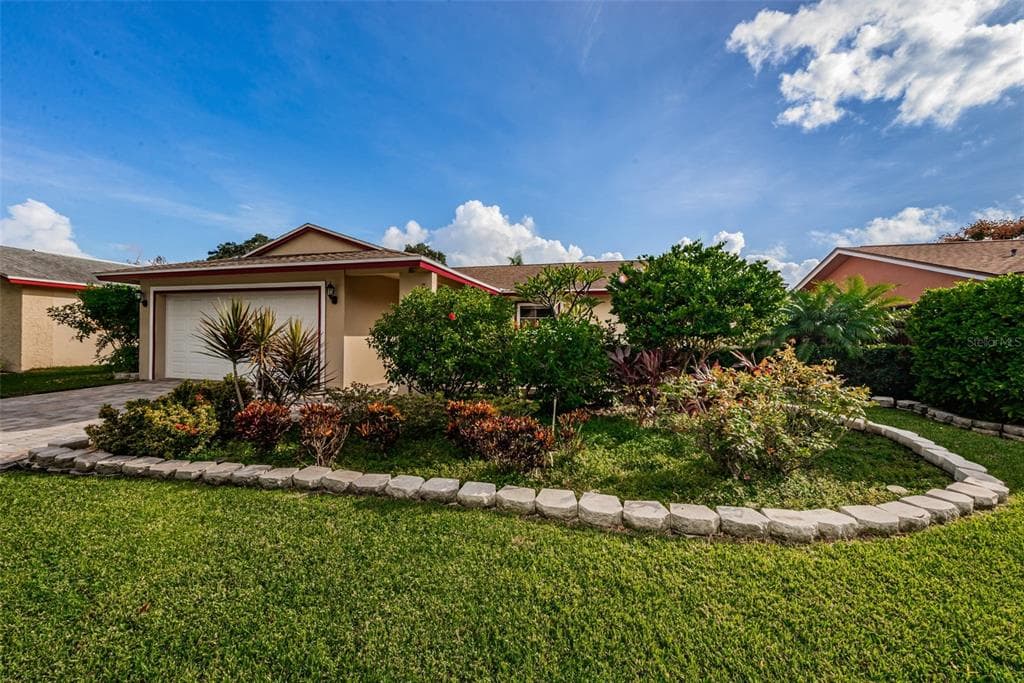 1673 BROOK DRIVE DUNEDIN, FL 34698
