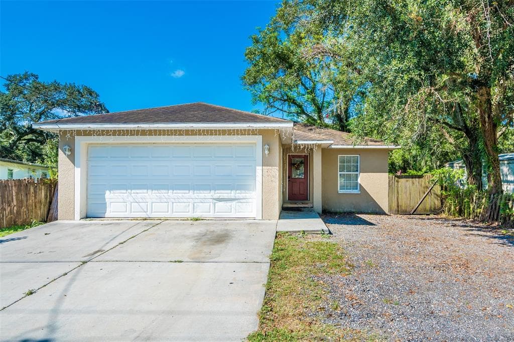 12314 FOUR OAKS ROAD TAMPA, FL 33624