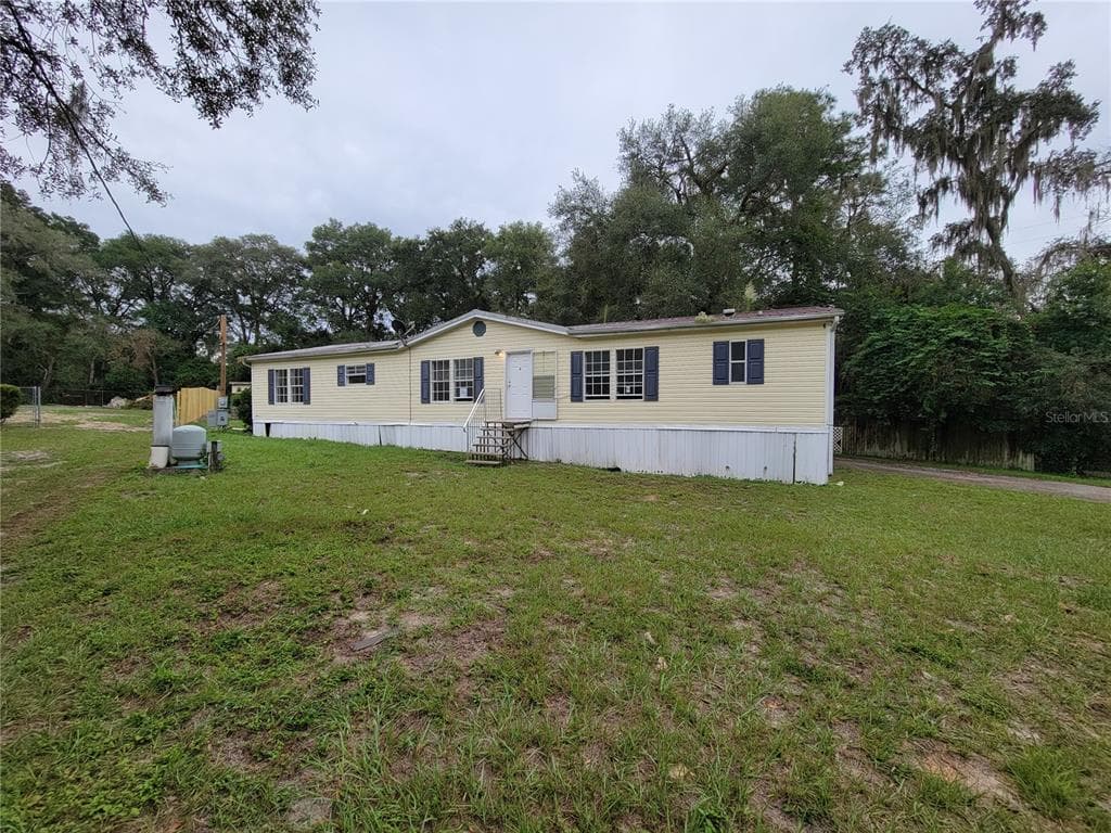 12641 IDLEWOOD DRIVE THONOTOSASSA, FL 33592