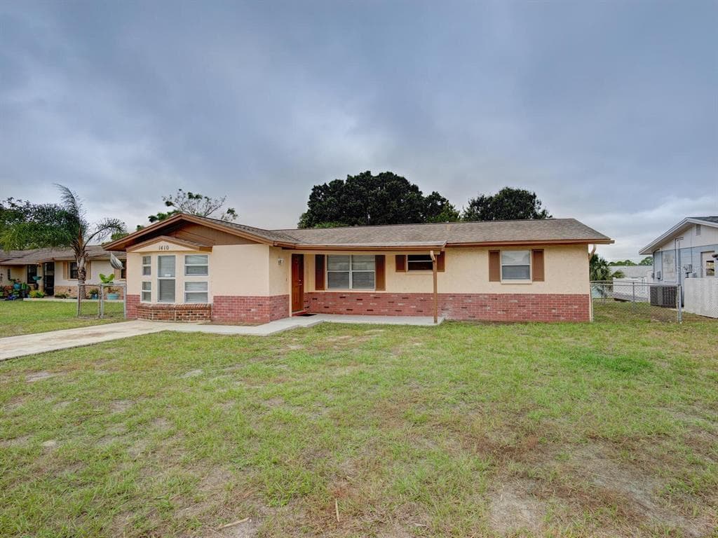 1410 STONE CREEK DRIVE TARPON SPRINGS, FL 34689