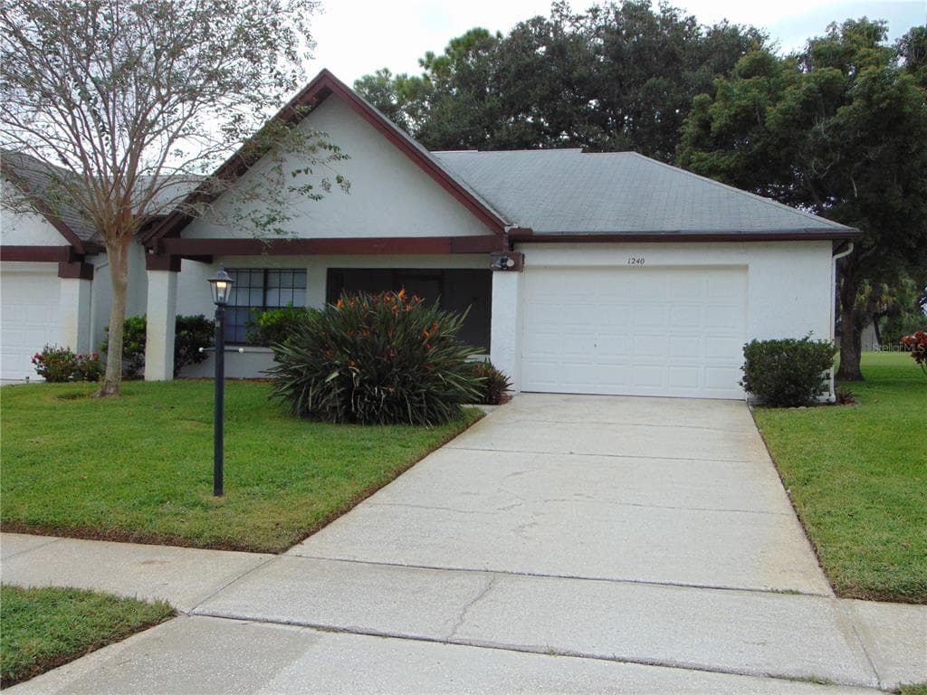 1240 CAMELOT COURT PALM HARBOR, FL 34684