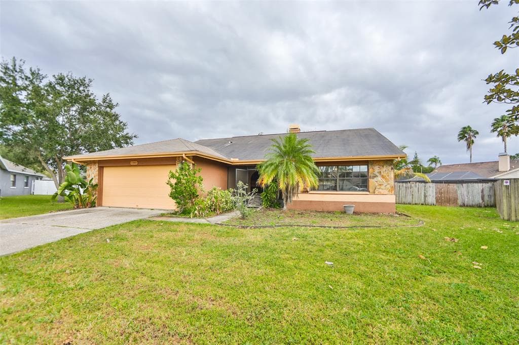 12002 MISTY BROOK COURT TAMPA, FL 33635