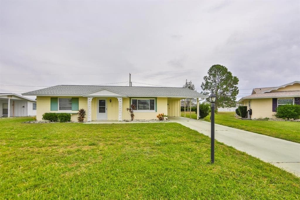 1209 SIMMONS WAY SUN CITY CENTER, FL 33573