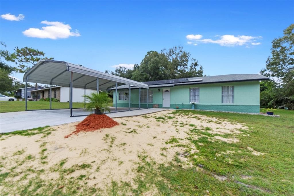 319 E PRIMROSE LANE LADY LAKE, FL 32159